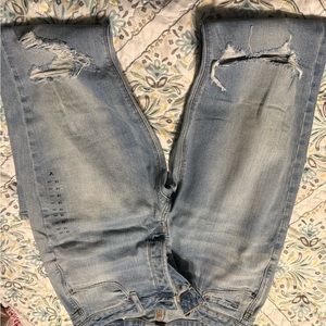 Distressed Light Blue Jeans